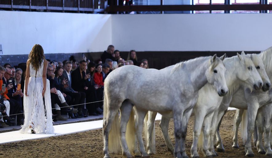 A model wears a creation from the Stella McCartney Fall/Winter 2026-2027 Women's collection presented in Paris, Wednesday, March 4, 2026. (AP Photo/Tom Nicholson)