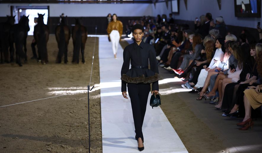 A model wears a creation from the Stella McCartney Fall/Winter 2026-2027 Women's collection presented in Paris, Wednesday, March 4, 2026. (AP Photo/Tom Nicholson)