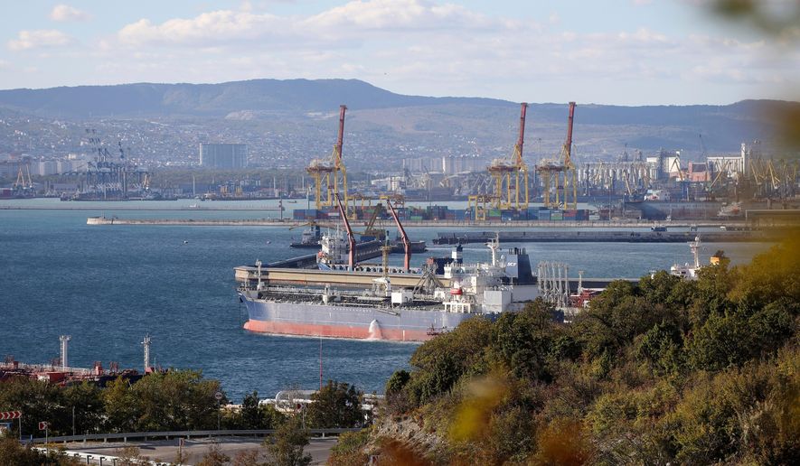 An oil tanker is moored at the Sheskharis complex in Novorossiysk, Russia, Tuesday, Oct. 11, 2022. (AP Photo, File)