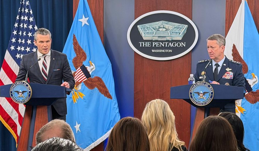 Defense Secretary Pete Hegseth and Chairman of the Joint Chiefs of Staff Gen. Dan Caine, speak during a press briefing at the Pentagon, Wednesday, March 4, 2026, in Washington. (AP Photo/Konstantin Toropin)