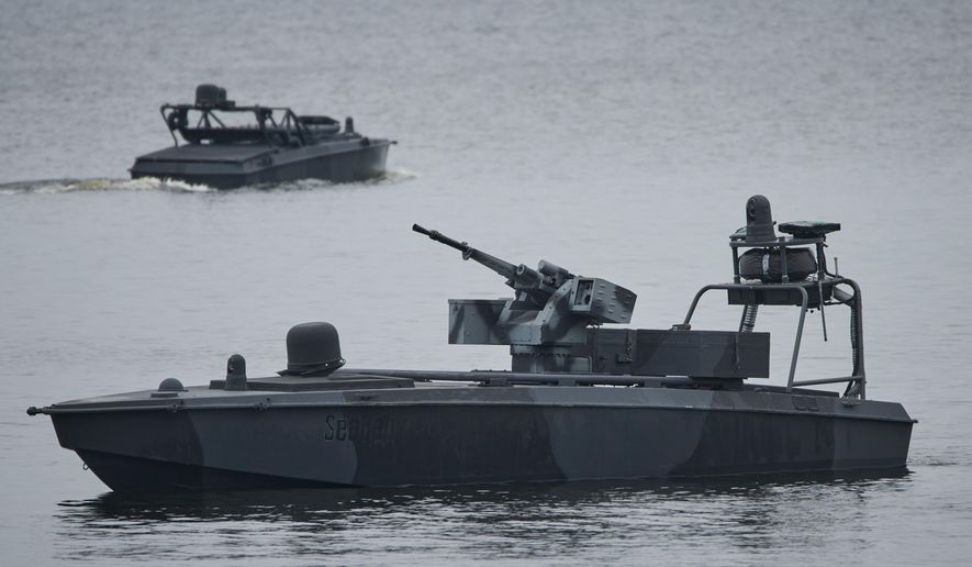 Sea Baby drones ride on the water during a demonstration by Ukraine's Security Service in an undisclosed location in Ukraine Friday, Oct. 17, 2025. (AP Photo/Efrem Lukatsky, File)