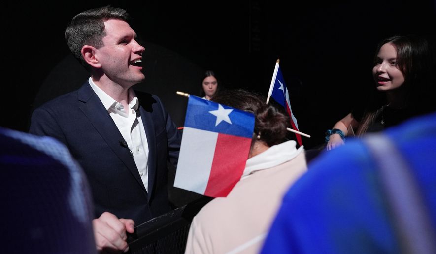 Texas Democratic Senate candidate Texas state Rep. James Talarico, D-Austin, meets with attendees after speaking for the first time since winning the Democratic nomination in Austin, Wednesday, March 4, 2026. (AP Photo/Eric Gay)