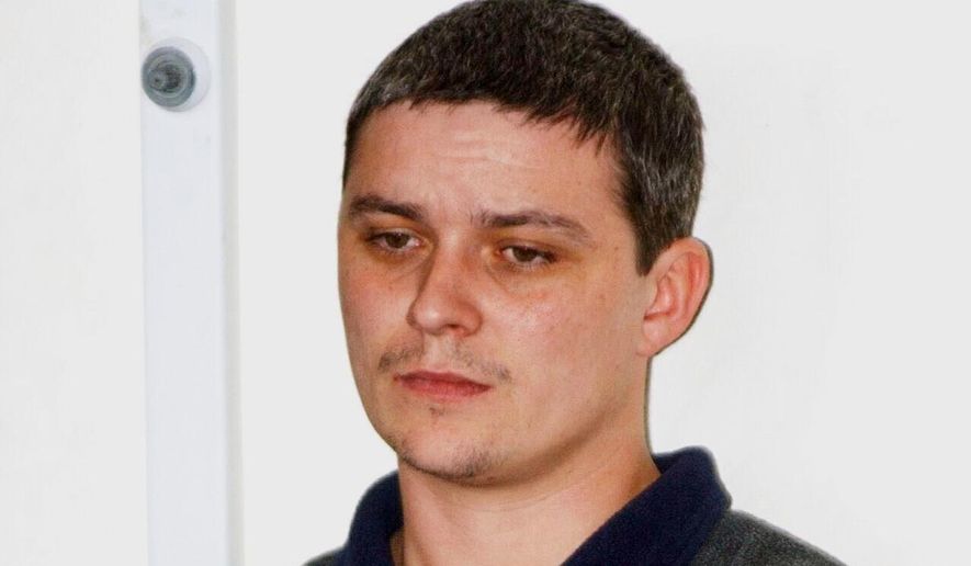 Ian Huntley looks on in this Aug. 10, 2002, in Soham, England. (Toby Melville/PA via AP, File)