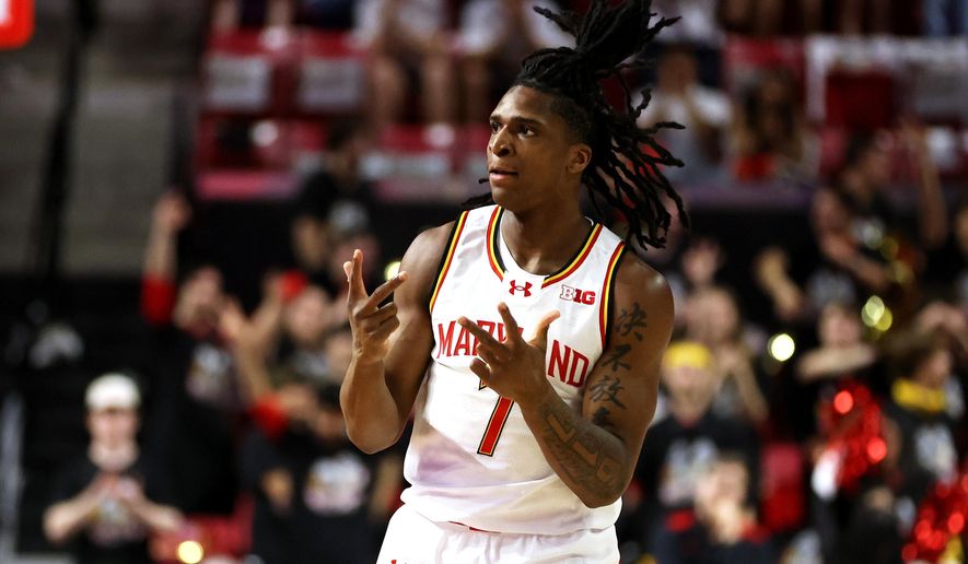Maryland guard Andre Mills celebrates during the first half of an NCAA college basketball game against Illinois, Sunday, March 8, 2026, in College Park, Md. (AP Photo/Daniel Kucin Jr.)