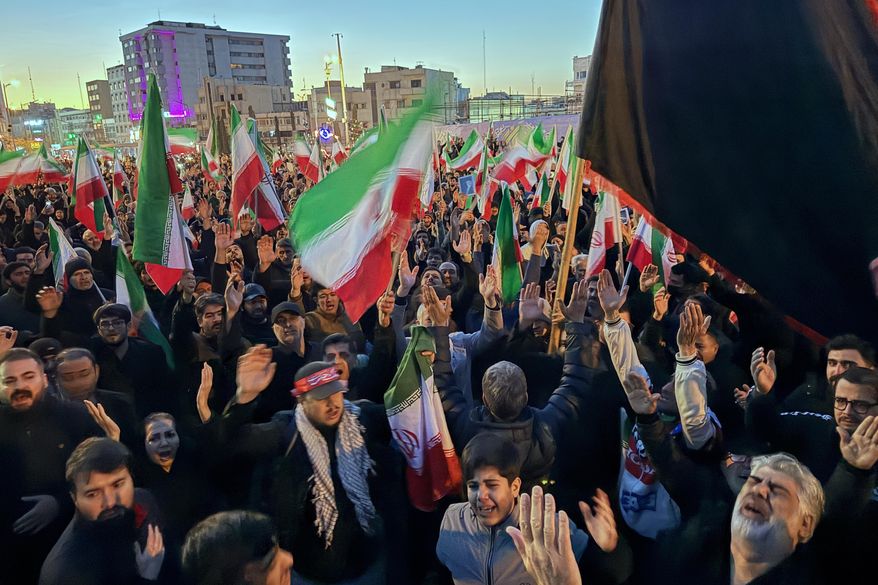 Government supporters gather in mourning after state TV announced the death of Iranian Supreme Leader Ayatollah Ali Khamenei, in Tehran, Iran, on March 1, 2026. (AP Photo/Vahid Salemi, File)