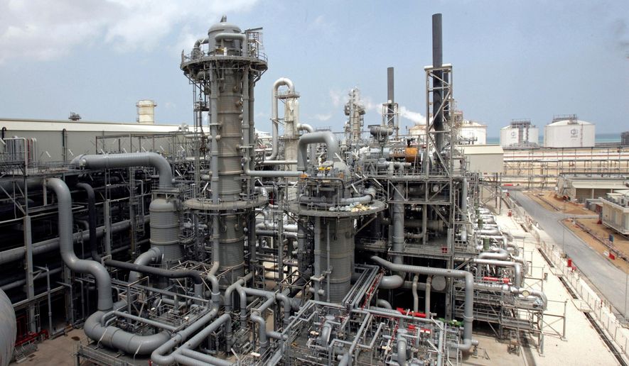 This April 4, 2009, file photo, shows a gas production facility at Ras Laffan, Qatar. (AP Photos/Maneesh Bakshi, File)