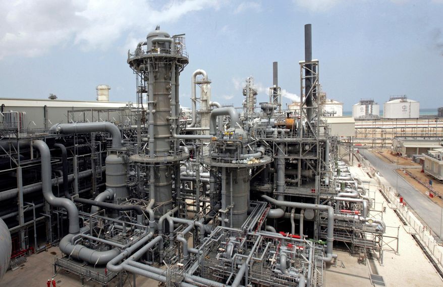 This April 4, 2009, file photo, shows a gas production facility at Ras Laffan, Qatar. (AP Photos/Maneesh Bakshi, File)