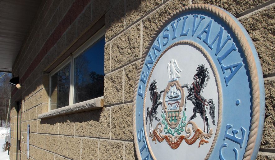 In this March 6, 2015 photo, a sign marks the location of the barracks for the Pennsylvania State Police in Blooming Grove Township, Pa. (AP Photo/Michael Rubinkam, file)