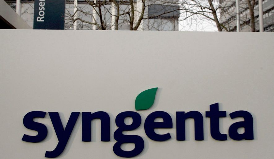 FILE - The Syngenta logo is seen outside the company's headquarters, Feb. 7, 2007, in Basel, Switzerland. (Georgios Kefalas/Keystone via AP, File)