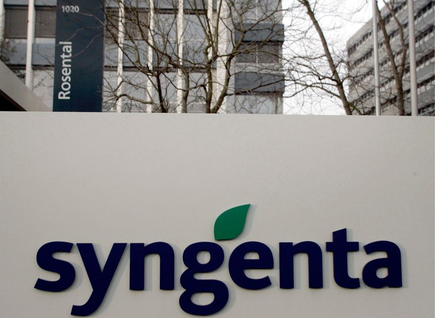 FILE - The Syngenta logo is seen outside the company's headquarters, Feb. 7, 2007, in Basel, Switzerland. (Georgios Kefalas/Keystone via AP, File)