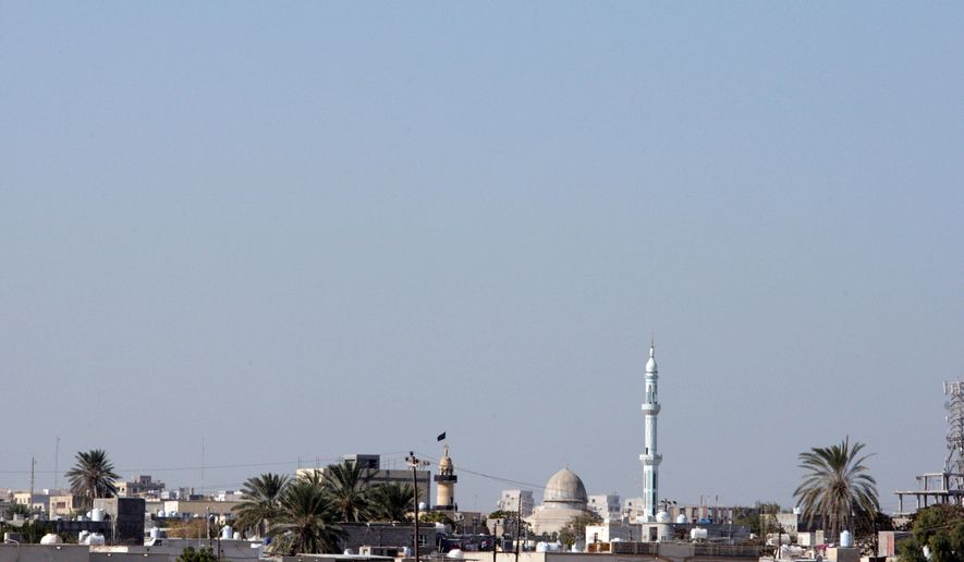 FILE -A view of the island of Qeshm, which oversees the strategic waterway of the Strait of Hormuz, Iran, on Dec. 24, 2011. (AP Photo/Vahid Salemi, File)