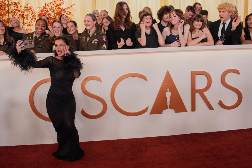 Bella Thorne arrives at the Oscars on Sunday, March 15, 2026, at the Dolby Theatre in Los Angeles. (AP Photo/John Locher)