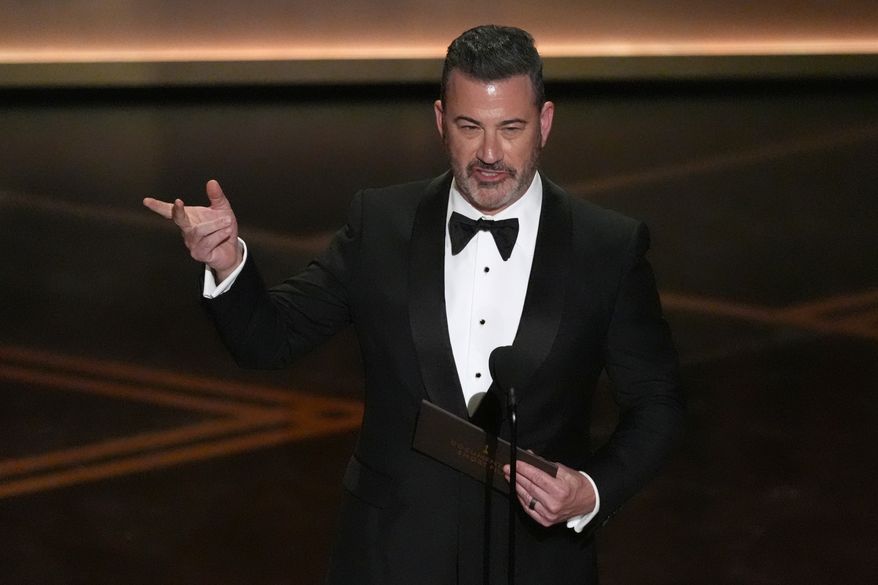 Jimmy Kimmel presents the award for best documentary short film during the Oscars on Sunday, March 15, 2026, at the Dolby Theatre in Los Angeles. (AP Photo/Chris Pizzello)