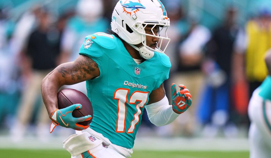FILE - Miami Dolphins wide receiver Jaylen Waddle (17) runs during the first half of an NFL football game against the Tampa Bay Buccaneers, Dec. 28, 2025, in Miami Gardens, Fla. (AP Photo/Lynne Sladky, File)