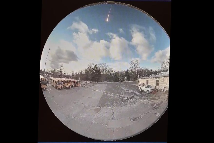 This image made from video shows video taken from a surveillance camera showing a suspected meteor falling through the sky in Olmsted Falls, Ohio, on Tuesday, March, 17, 2026. (Olmsted Falls City Schools via AP)
