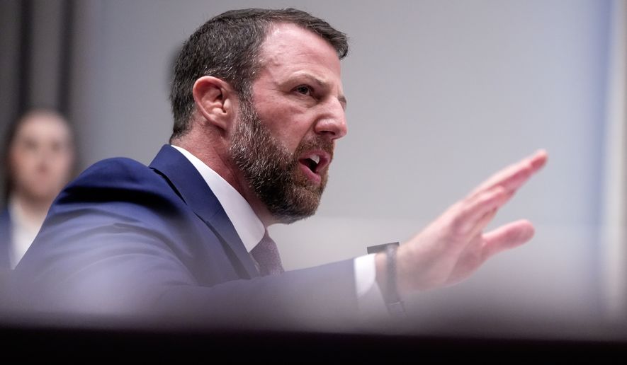 Sen. Markwayne Mullin, R-Okla., President Donald Trump's pick for Homeland Security secretary, testifies during Senate Committee on Homeland Security and Governmental Affairs hearing, Wednesday, March 18, 2026 on Capitol Hill in Washington. (AP Photo/Manuel Balce Ceneta)