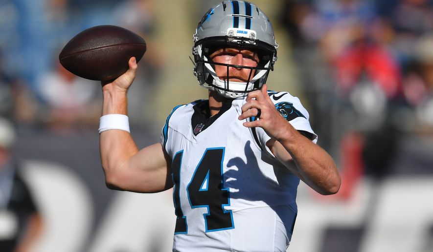 FILE - Carolina Panthers quarterback Andy Dalton. looks to throw a pass against the New England Patriots during the second half of an NFL football game, Sunday, Sept. 28, 2025, in Foxborough, Mass. (AP Photo/Steven Senne, File)