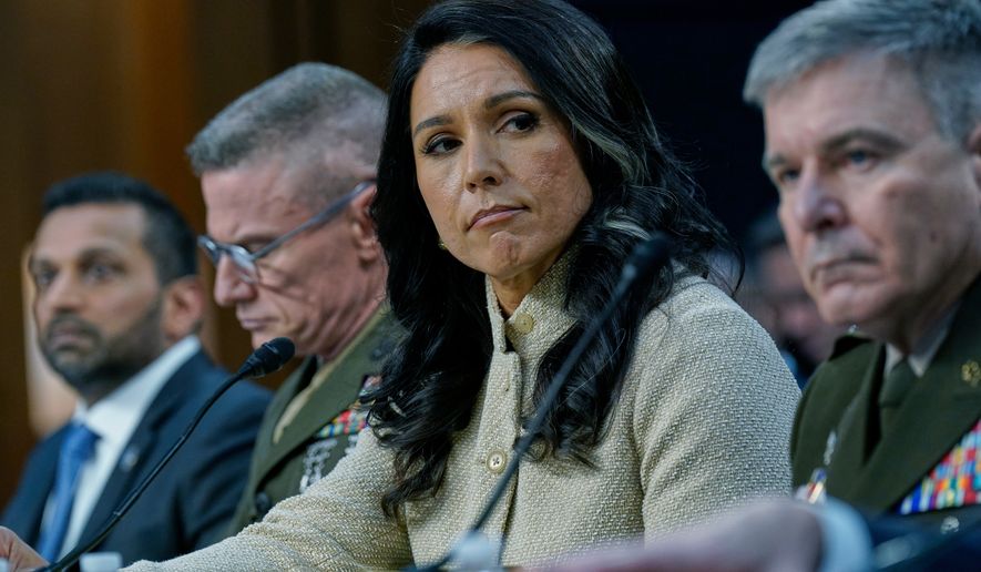 From left, FBI Director Kash Patel, Defense Intelligence Agency Director James Adams III, Director of National Intelligence Tulsi Gabbard, and Acting Commander of the U.S. Cyber Command William Hartman, listen during the Senate Committee on Intelligence hearings to examine worldwide threats on Capitol Hill Wednesday, March 18, 2026, in Washington. (AP Photo/Jose Luis Magana)