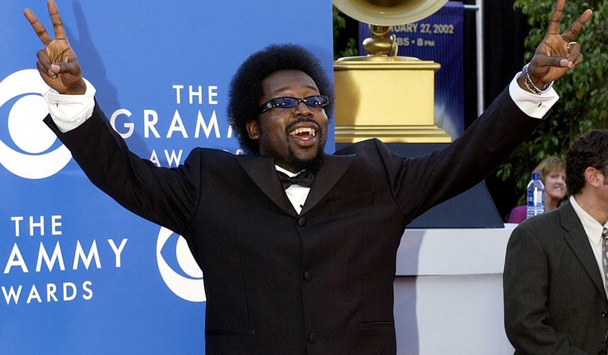 Grammy-nominated rapper Afroman poses for photographers as they arrive at the 44th annual Grammy Awards, Wednesday, Feb. 27, 2002, in Los Angeles. Afroman is nominated for Best Rap Solo Perfomance for his single "Because I Got High." (AP Photo/Mark J. Terrill)