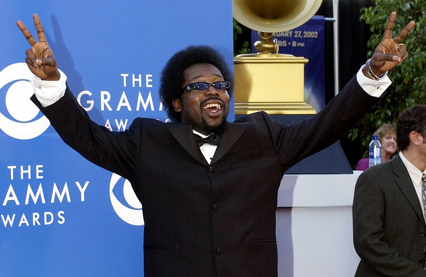 Grammy-nominated rapper Afroman poses for photographers as they arrive at the 44th annual Grammy Awards, Wednesday, Feb. 27, 2002, in Los Angeles. Afroman is nominated for Best Rap Solo Perfomance for his single "Because I Got High." (AP Photo/Mark J. Terrill)