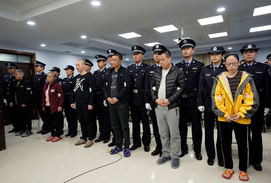 FILE - A trial continues as fentanyl drug traffickers are sentenced in court, Thursday, Nov. 7, 2019, in Xingtai, north China's Hebei Province. (Jin Liangkuai/Xinhua via AP, File)