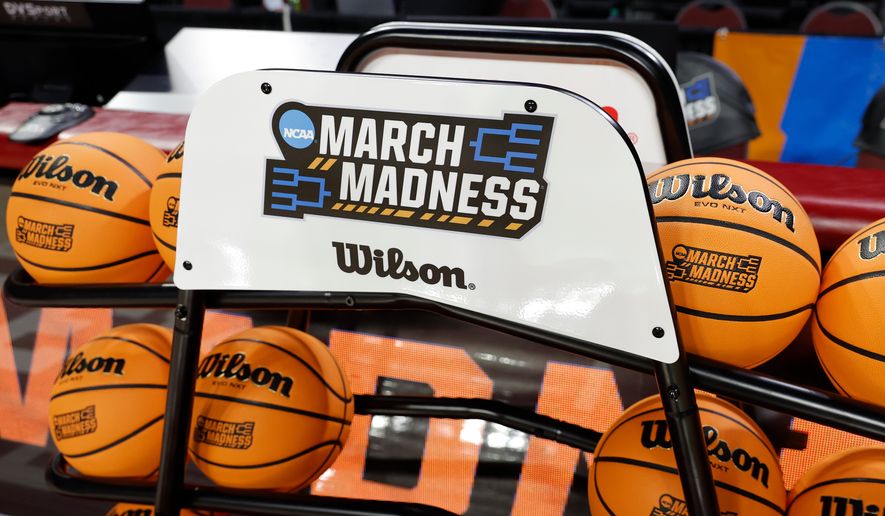 March Madness signage is displayed before a game between Colorado State and Michigan State in the first round of the NCAA college basketball tournament, Friday, March 20, 2026, Norman, Okla. (AP Photo/Alonzo Adams)