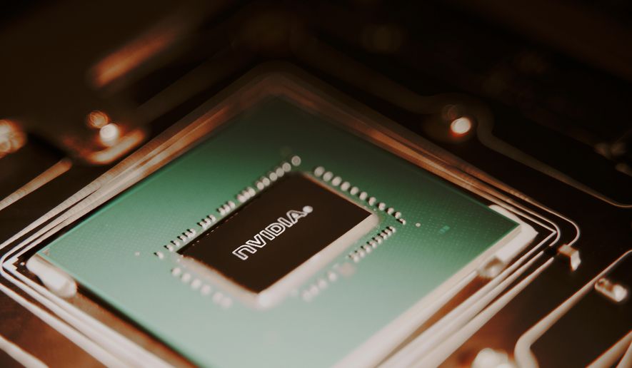 Nvidia GPU chip close-up. Graphic card of computer circuit board macro photo. File photo credit: alexgo.photography via Shutterstock.