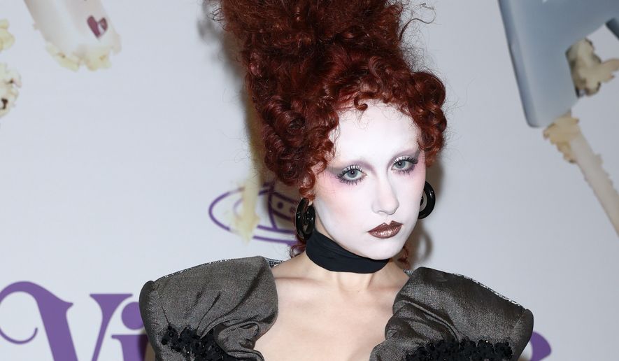 Chappell Roan poses for photographers at the photo call for the Vivienne Westwood Fall/Winter 2026-2027 Women's collection presented in Paris, Saturday, March 7, 2026. (AP Photo/Tom Nicholson)