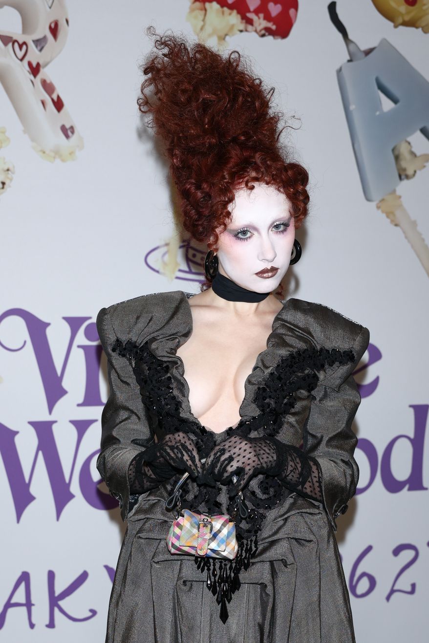 Chappell Roan poses for photographers at the photo call for the Vivienne Westwood Fall/Winter 2026-2027 Women's collection presented in Paris, Saturday, March 7, 2026. (AP Photo/Tom Nicholson)