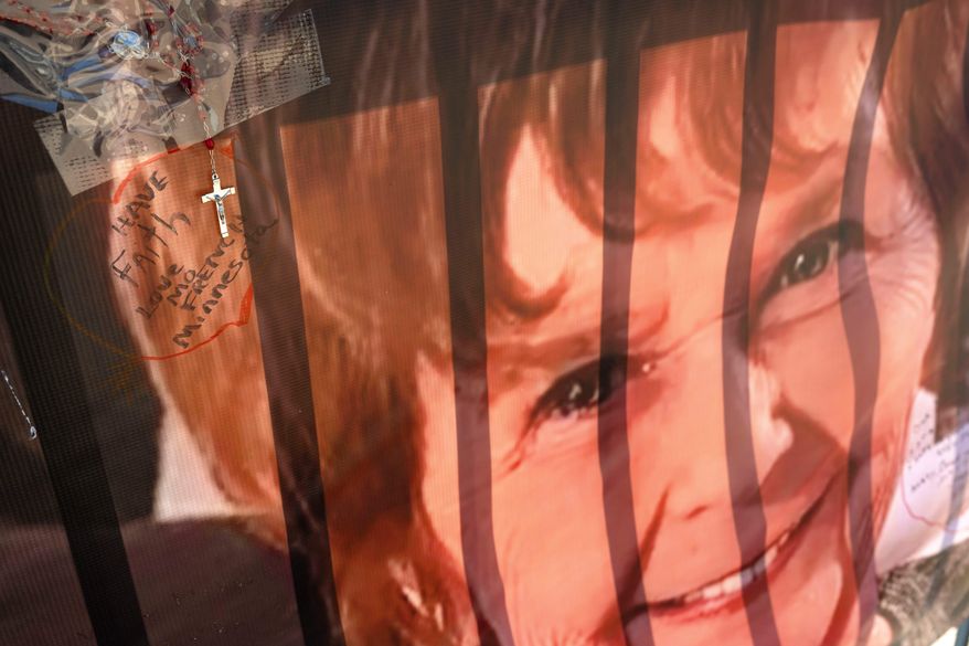 A banner with notes from hundreds of well-wishers for Nancy Guthrie, the missing mother of "Today" show host Savannah Guthrie, is displayed outside of KVOA Newsroom on March 6, 2026, in Tucson, Ariz. (AP Photo/Rebecca Noble, File)