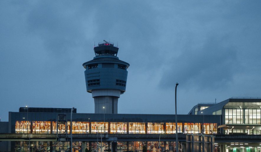 A control tower is seen at LaGuardia International Airport on Saturday, Nov. 8, 2025, in New York. (AP Photo/Olga Fedorova, File)