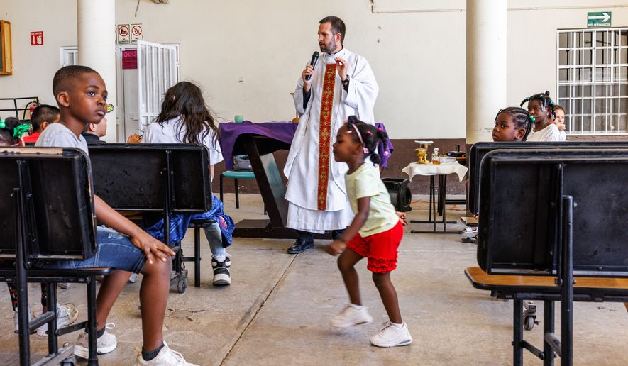 The Rev. Brian Strassburger speaks during Mass at Casa del Migrante on Thursday, March 19, 2026, in Reynosa, Mexico. (AP Photo/Michael Gonzalez)