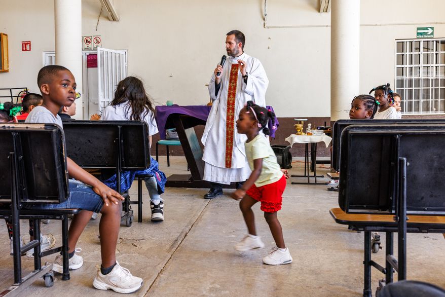 The Rev. Brian Strassburger speaks during Mass at Casa del Migrante on Thursday, March 19, 2026, in Reynosa, Mexico. (AP Photo/Michael Gonzalez)
