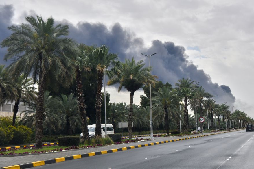 Smoke rises from Kuwait International Airport after a drone strike on fuel storage in Kuwait City, Kuwait, Friday, Wednesday, March 25, 2026. (AP Photo) ** FILE **