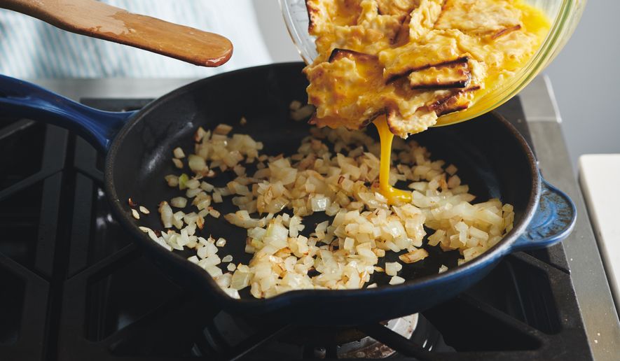 A recipe for matzoh brei is prepared in New York on May 30, 2019. (Cheyenne M. Cohen via AP)