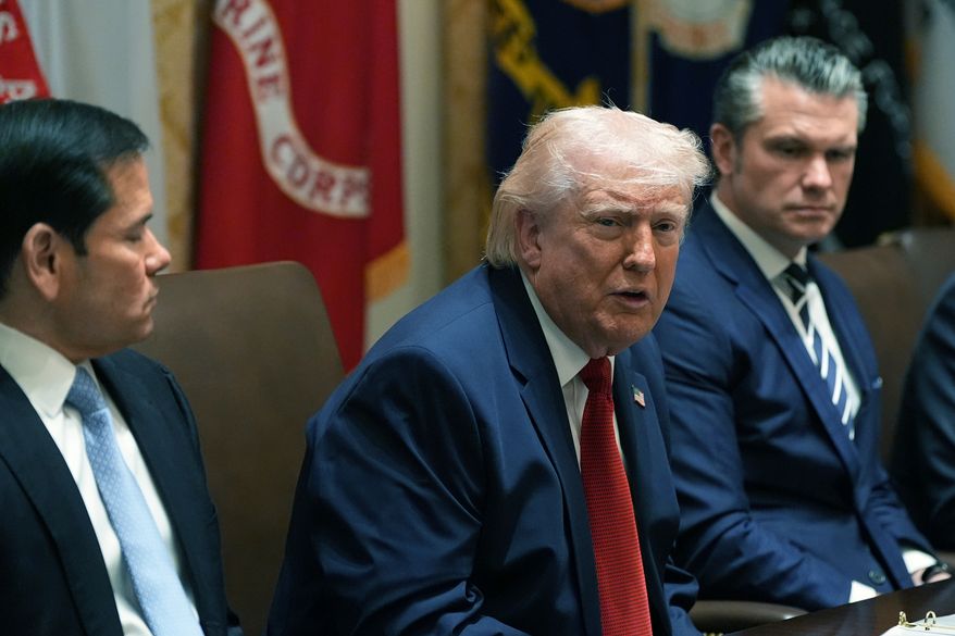 President Donald Trump speaks during a Cabinet meeting at the White House, Thursday, March 26, 2026, in Washington. From left are Secretary of State Marco Rubio, Trump and Secretary of Defense Pete Hegseth. (AP Photo/Alex Brandon)