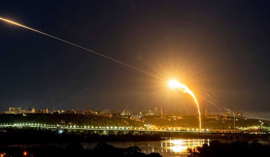Ukrainian air defense intercepts a Shahed drone midair in the third Russian aerial attack on the capital in the last 24 hours in Kyiv, Ukraine, on Tuesday, May 30, 2023. (AP Photo/Evgeniy Maloletka, File)