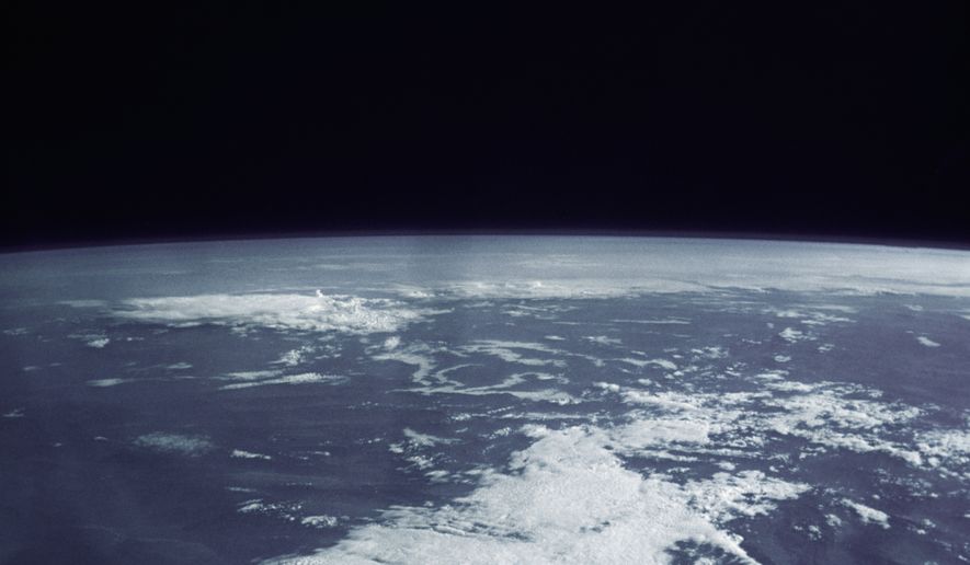 This photo provided by NASA shows the Atlantic Ocean as astronaut Leroy Gordon Cooper orbits the earth in spaceship Faith 7 on May 16, 1963. (AP Photo/NASA, File)