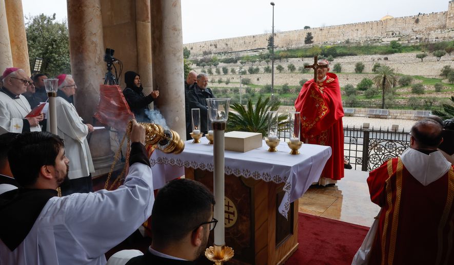 Cardinal Pierbattista Pizzaballa, the Latin Patriarch of Jerusalem, holds a prayer service to mark Palm Sunday in Jerusalem, Sunday, March 29, 2026. (Ammar Awad/Pool Photo via AP)