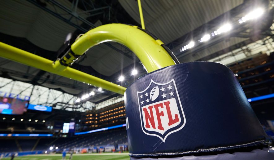 In this Aug. 13, 2021, photo, an NFL logo is displayed on a goalpost pad during an NFL preseason football game between the Buffalo Bills and the Detroit Lions in Detroit. (AP Photo/Rick Osentoski) **FILE**