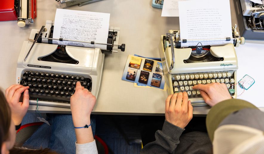 Student use typewriters to complete a writing assignment in German at Cornell University, Friday, March 20, 2026, in Ithaca, N.Y. The professor, Grit Matthias Phelps, brings out the typewriters once each semester for students to disconnect from technology and connect with the assignment in a different way. (AP Photo/Lauren Petracca)