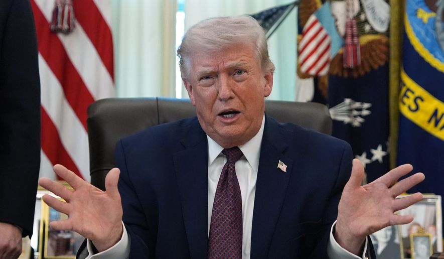 President Donald Trump speaks in the Oval Office of the White House before signing an executive order Tuesday, March 31, 2026, in Washington. (AP Photo/Alex Brandon)