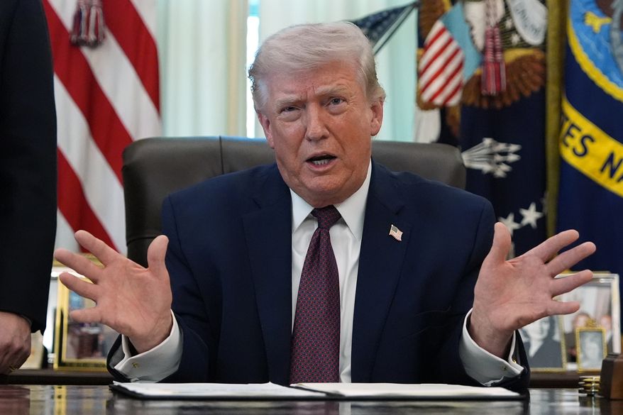President Donald Trump speaks in the Oval Office of the White House before signing an executive order Tuesday, March 31, 2026, in Washington. (AP Photo/Alex Brandon)
