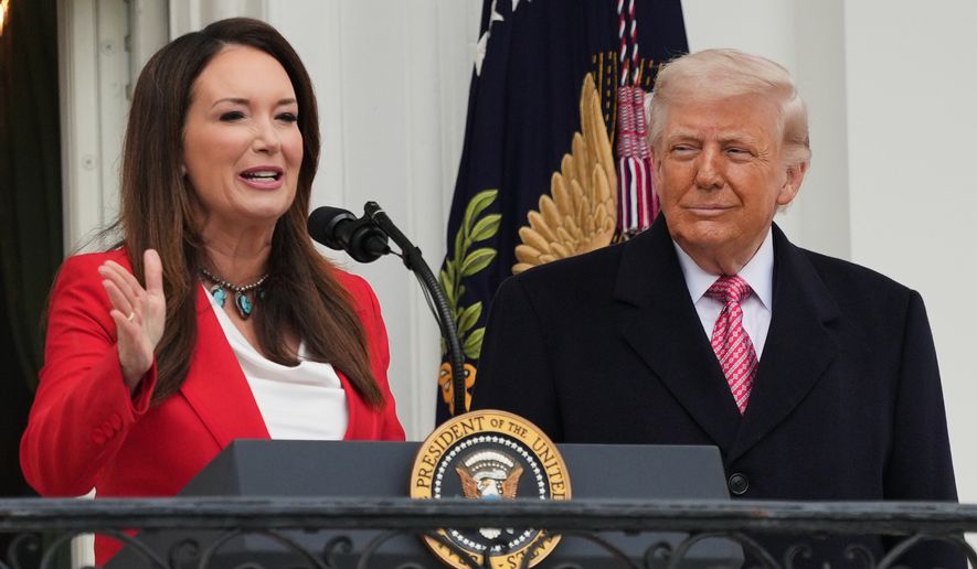 President Donald Trump listens to Agriculture Secretary Brooke Rollins speak during an event with farmers on the South Lawn of the White House, Friday, March 27, 2026, in Washington. (AP Photo/Julia Demaree Nikhinson)