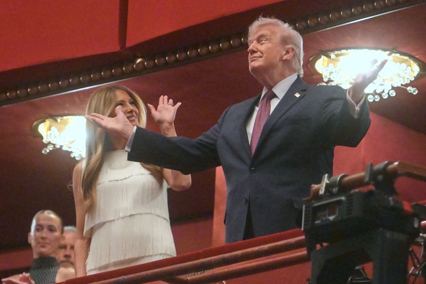 President Donald Trump and first lady Melania Trump arrive to attend the opening nights of the musical "Chicago" at the John F. Kennedy Center for the Performing Arts in Washington, Tuesday, March 31, 2026. (AP Photo/Rod Lamkey, Jr.)