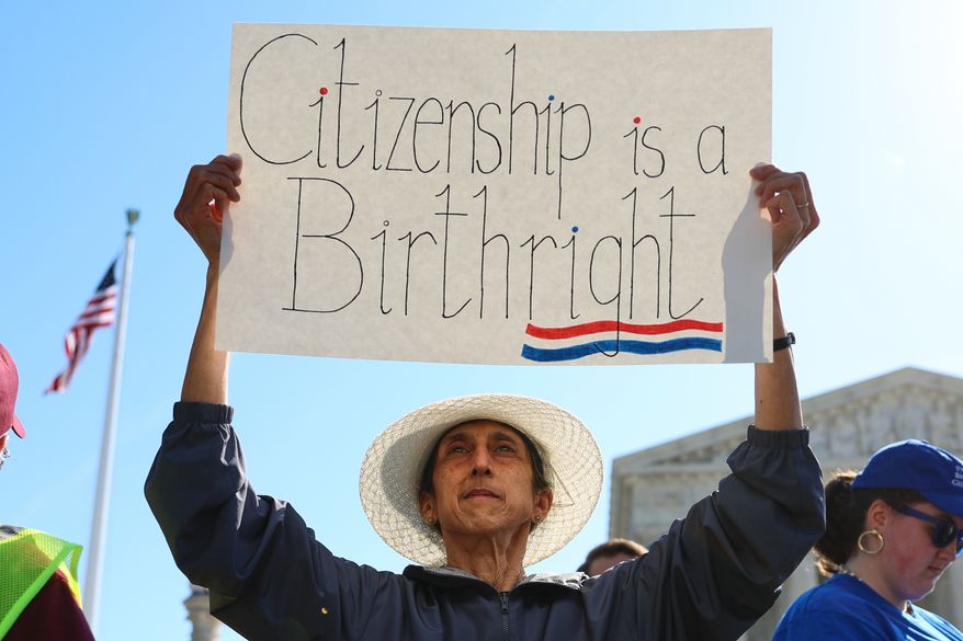 Demonstrators rally outside the U.S. Supreme Court as justices hear oral arguments on whether President Donald Trump can deny citizenship to children born to parents who are in the United States illegally or temporarily, on Capitol Hill in Washington, Wednesday, April 1, 2026. (AP Photo/Tom Brenner) ** FILE **