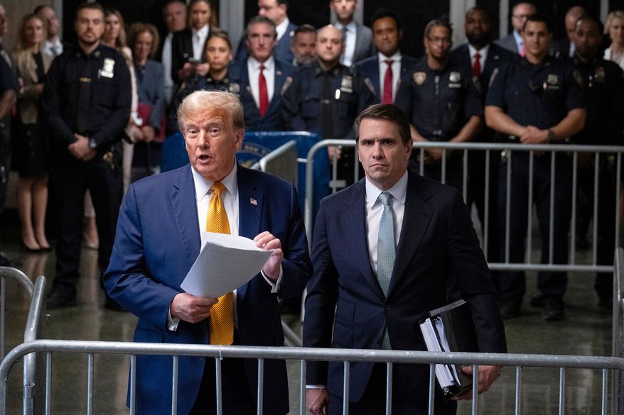 President Donald Trump, stands with then-defense attorney Todd Blanche, May 14, 2024, in New York. (AP Photo/Craig Ruttle, Pool, file)