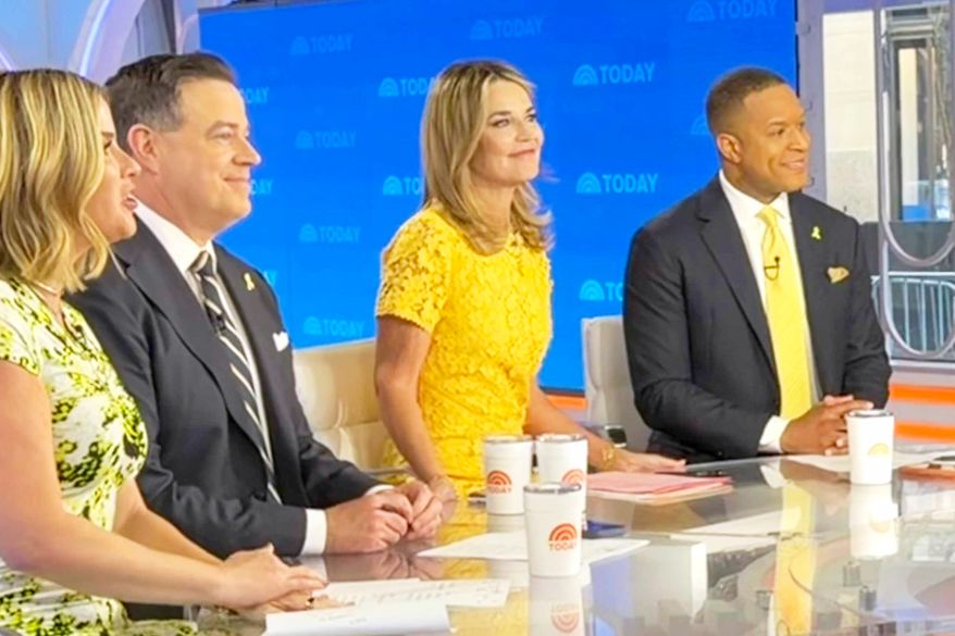 This image released by NBC shows co-host Savannah Guthrie, center, with colleagues, from left, Jenna Bush Hager, Carson Daly, and Craig Melvin during the "Today" show in New York on Monday, April 6, 2026. (NBC/Today via AP)