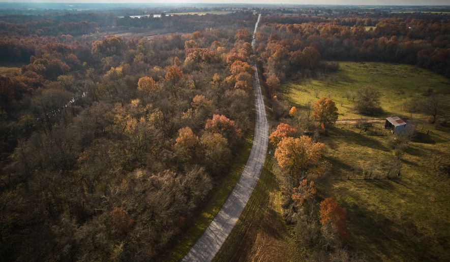 A portion of historic Route 66 winds through the countryside in Baxter Springs, Kan., Tuesday, Nov. 18, 2025. (AP Photo/Jeff Roberson)