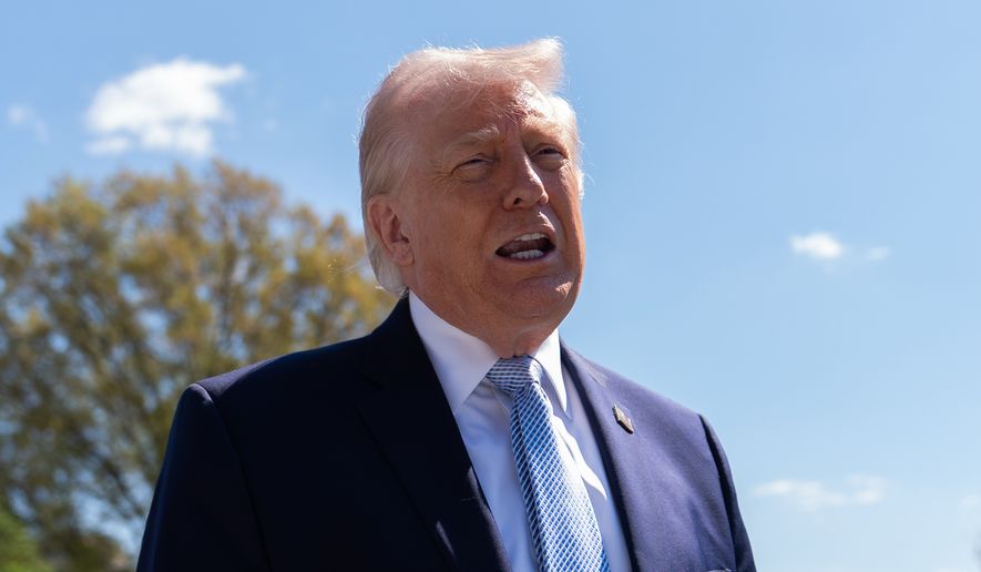 President Donald Trump speaks with reporters during the White House Easter Egg Roll on the South Lawn of the White House, Monday, April 6, 2026, in Washington. (AP Photo/Julia Demaree Nikhinson)